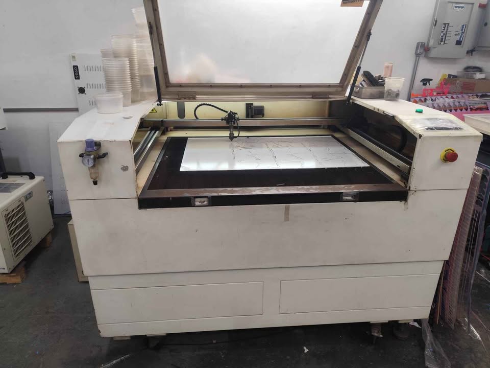 Máquina laser